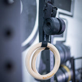 Bear KompleX Gymnastic Wood Rings Sideview hanging in gym
