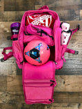 Pink mini military backpack open with soccer gear