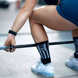 Squatting with weights while wearing BKX Performance Socks
