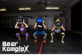 Bear KompleX Knee Sleeves - People working out with different colored knee sleeves